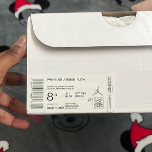 blue and navy blue jordan 1 low with a gray swoosh, size 8.5 womens